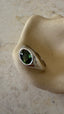 Custom white gold ring with green sapphire